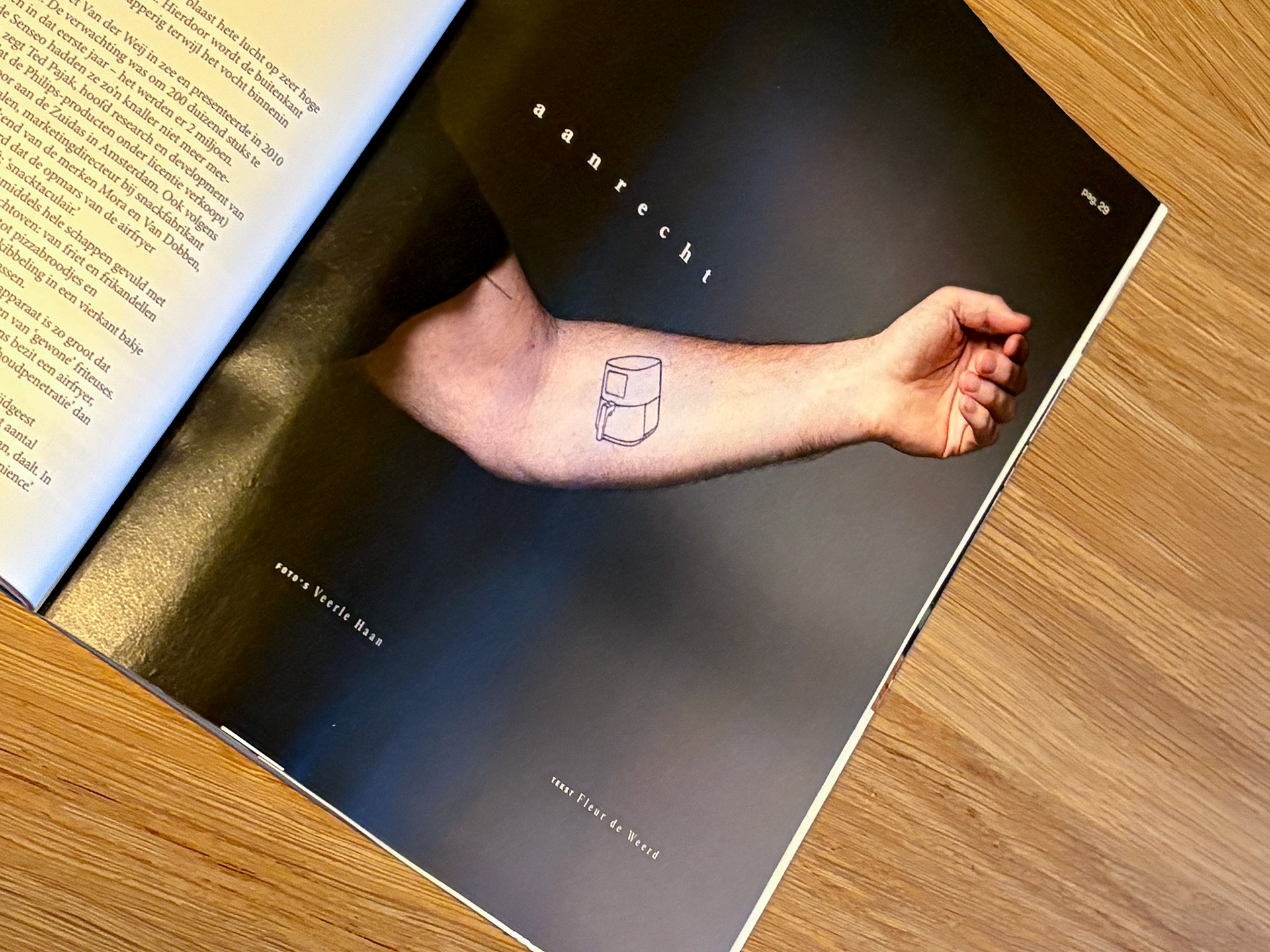 Een Philips airfryer op een arm getatoeëerd.